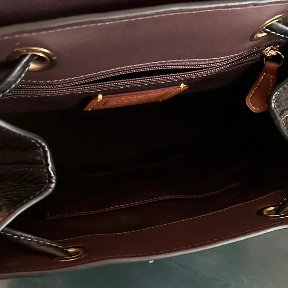 Coach compact pebbled